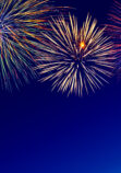 Colorful fireworks over night sky.